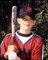 Photo of Claire's son in baseball uniform